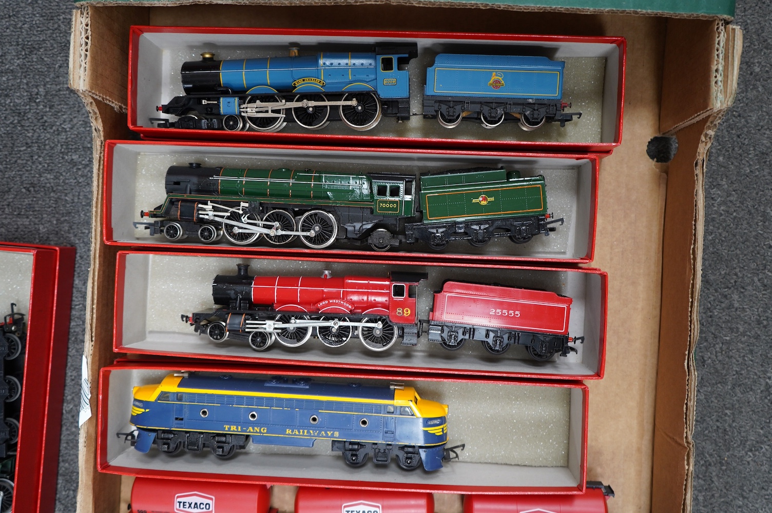 A collection of 00 gauge railway by Hornby, Tri-ang, etc., including eight locomotives and nine freight wagons. Condition - fair, some running wear and possible minor damage, etc.